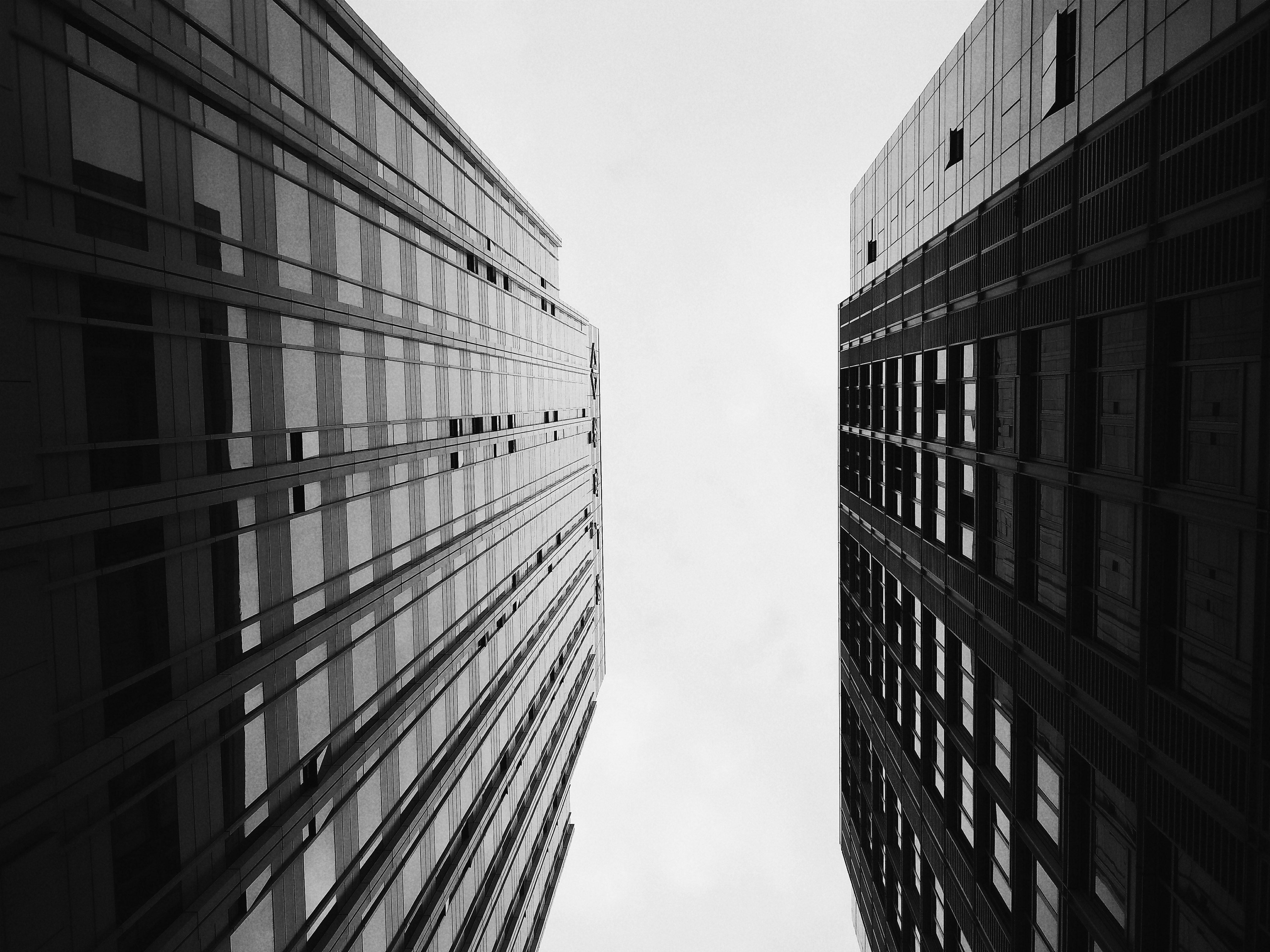 low angle photography of highrise buildings